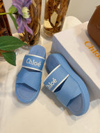 CHLOÉ WOODY WEDGE SANDALS IN CERULEAN BLUE CANVAS WITH RUBBER SOLE