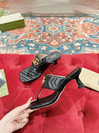HIGH THONG MULE 55MM IN BLACK CALFSKIN WITH GOLD HARDWARE