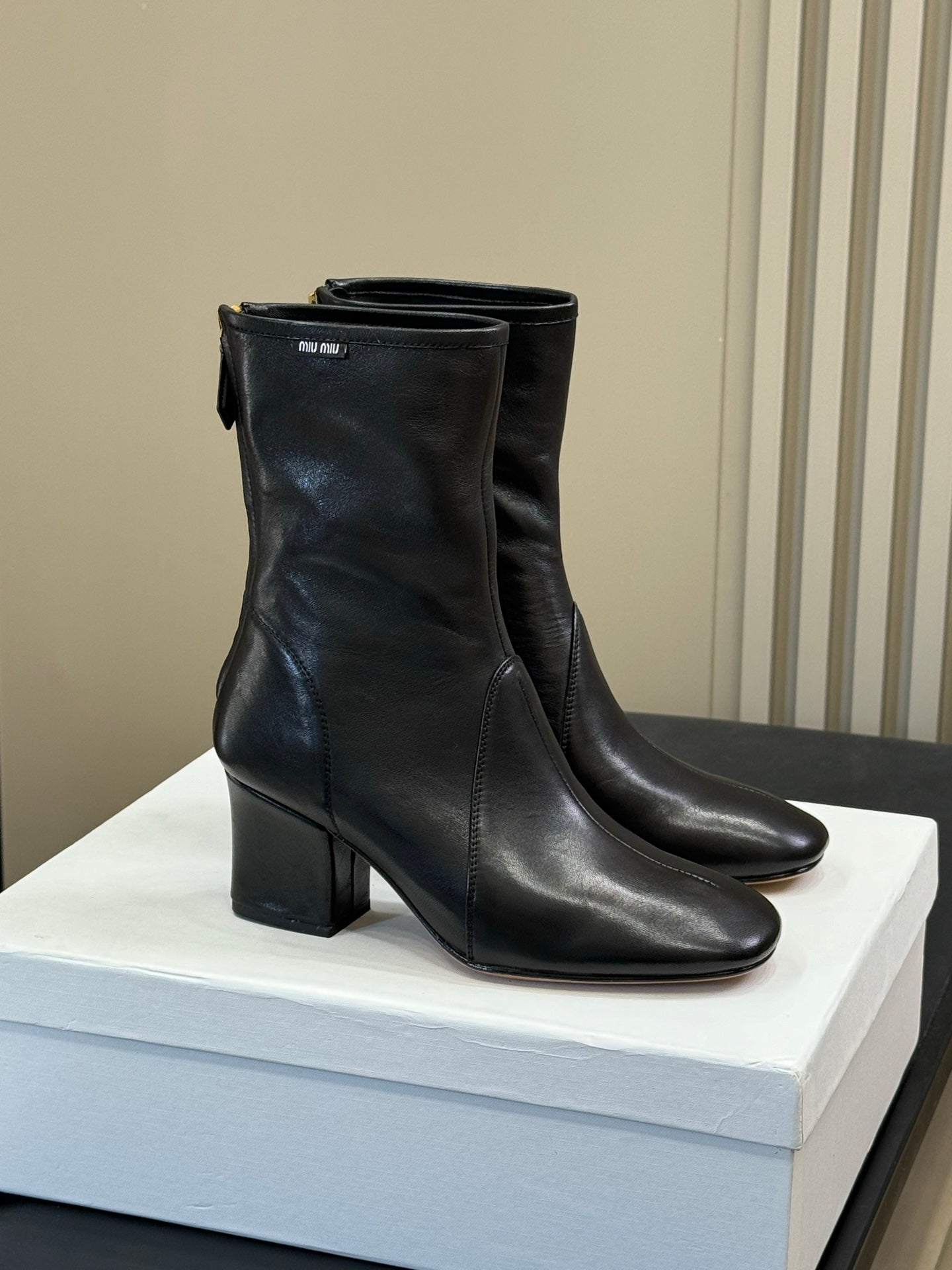 MiuMiu ankle boots black cowhide 521946
