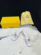 FENDI MEDIUM-HEELED 55 MM MULE IN WHITE LAMBSKIN WITH GOLD HARDWARE