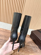 ALAIA high-heeled short boots black calfskin 386012