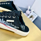 SNEAKER MULES IN BLACK CANVAS GRAFFITI LOGO