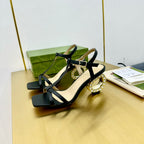 MEDIUM-HEEL SANDAL IN BLACK CALFSKIN WITH RHINSTONES