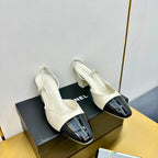 cc slingback pumps 65 in cream lambskin and black patent calfskin 137437
