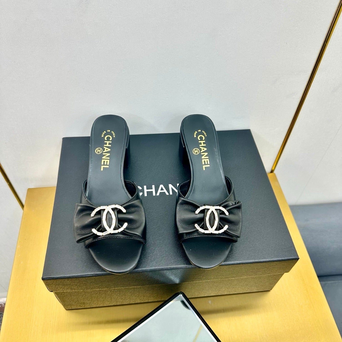 cc 25 bow mule sandal 50mm black sheepskin 238478