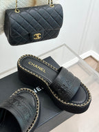 THICK SOLE WEDGE SLIPPERS IN BLACK CALFSKIN
