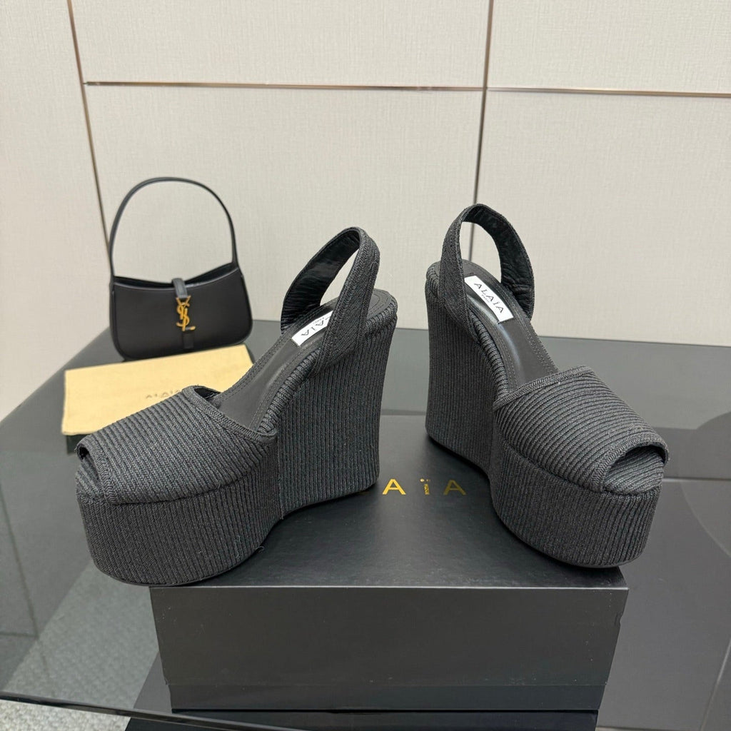 ALAIA platform sandal black sheepskin 389631