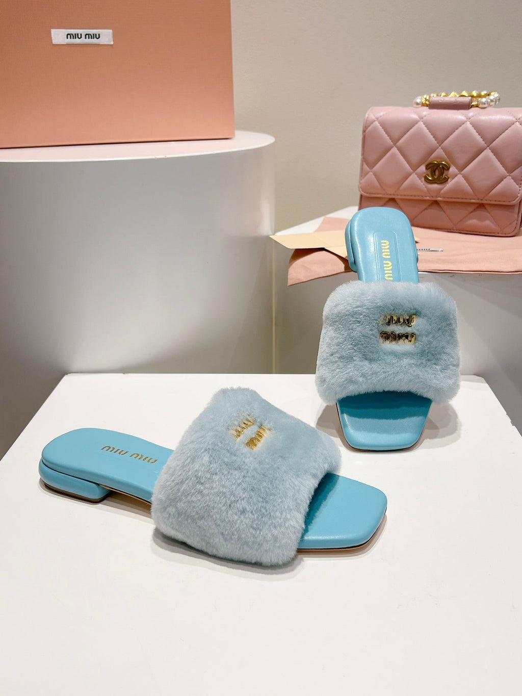 Miu Slides Light Blue Fur Leather 739564