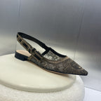 cd slingback flat transparent mesh embroidered black sun motif
