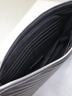 CLUTCH 30 IN BLACK QUILTED CALFSKIN SILVER BUCKLE