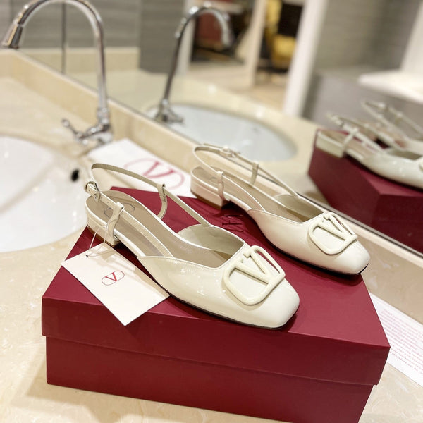 VLOGO WHITE PATENT LEATHER SLINGBACK FLATS