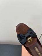 BOW MULES IN CHOCOLATE SUEDE