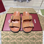 SANDALS IN BURNT ORANGE SUEDE EMBOSSED LOGO SILVER HARDWARE