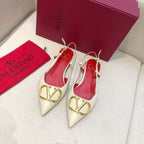 VLOGO SIGNATURE WHITE CALFSKIN FLAT SLINGBACK PUMP WITH GOLD LOGO