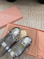 BOW MARY JANE FLAT IN SILVER LAMBSKIN
