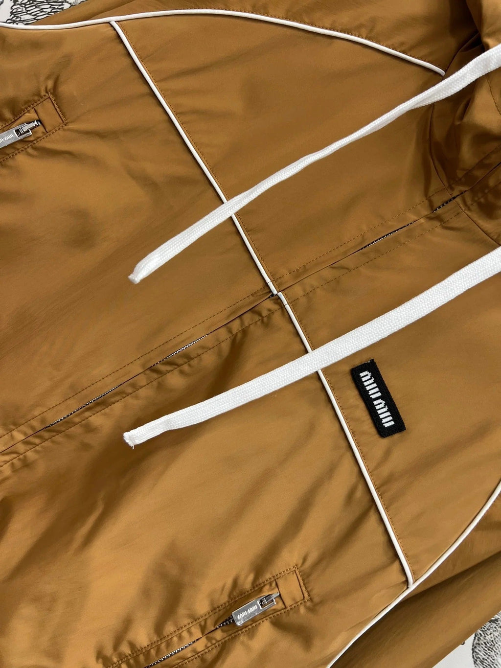 MIU 25S HOODED JACKET BROWN IN NYLON 263023