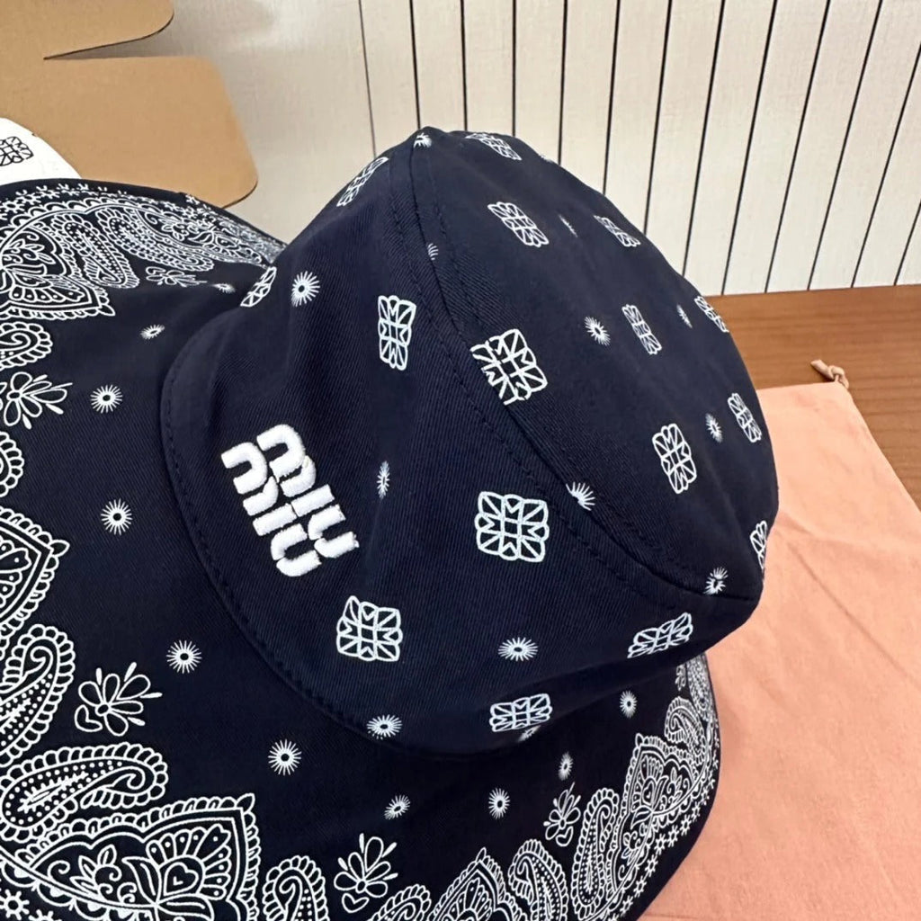 MM BUCKET IN BLACK FABRIC WITH EMBROIDERED PATTERN