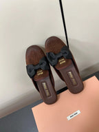 BOW MULES IN CHOCOLATE SUEDE