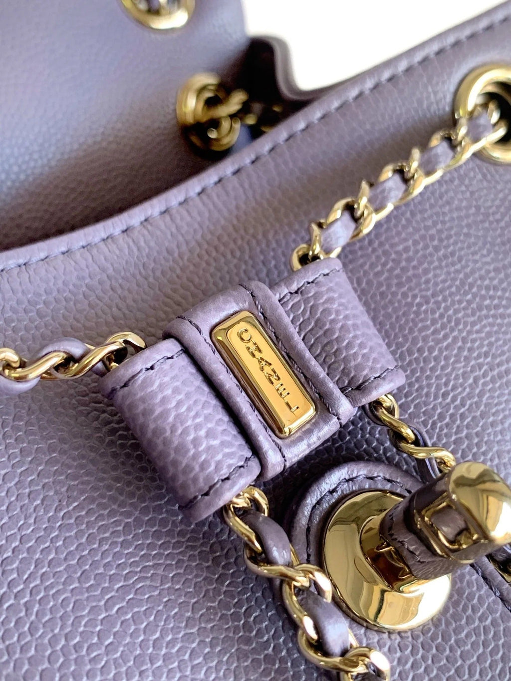 CHANEL 25S BACKPACK 17.5 CM IN PURPLE LAMBSKIN