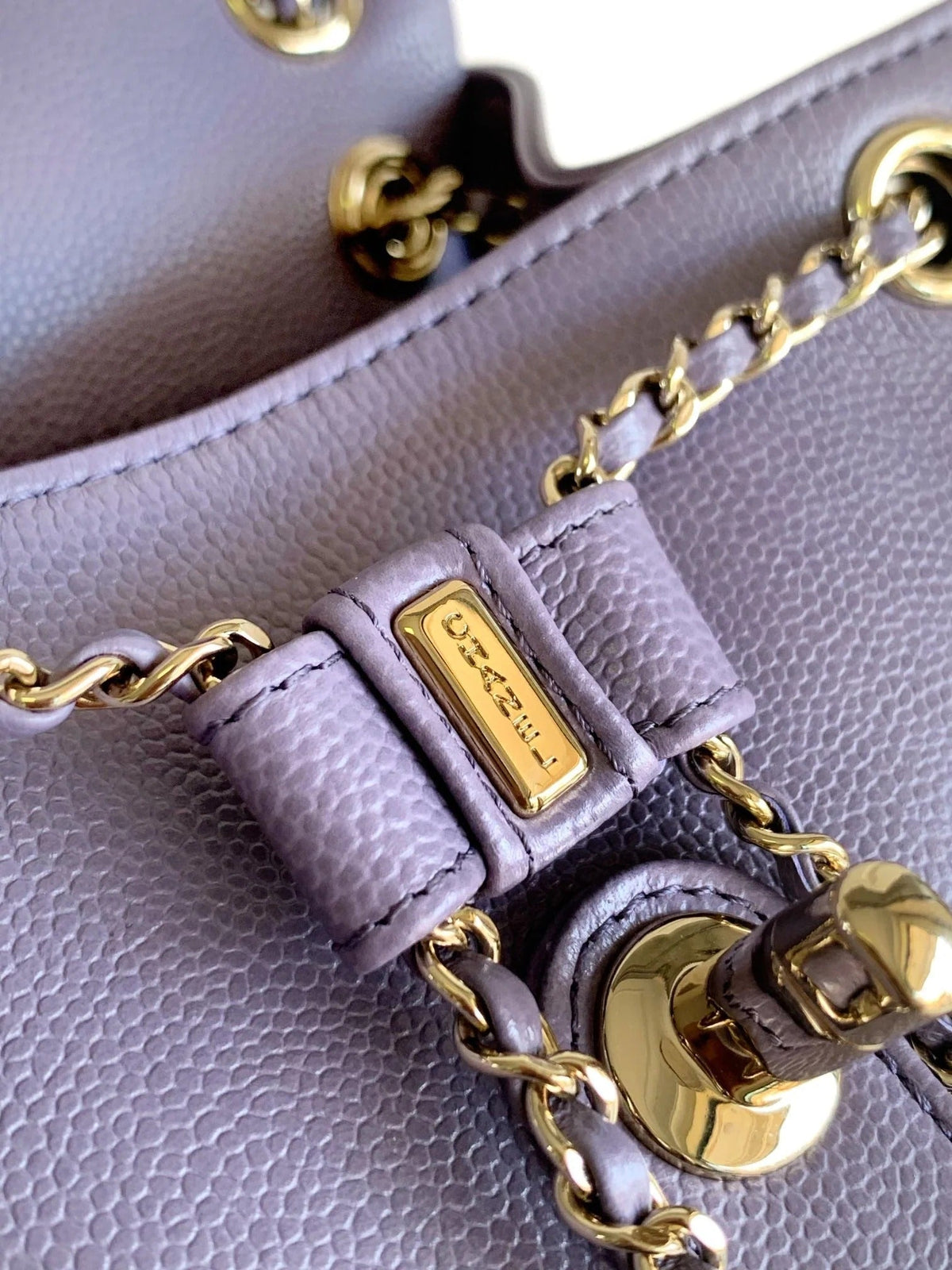 CHANEL 25S BACKPACK 17.5 CM IN PURPLE LAMBSKIN